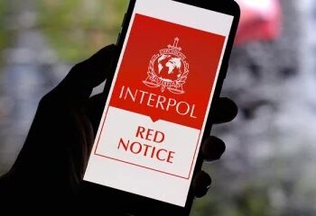 12 பேருக்கு சிவப்பு பிடியாணை