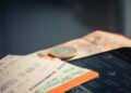 orange and green label airplane ticket